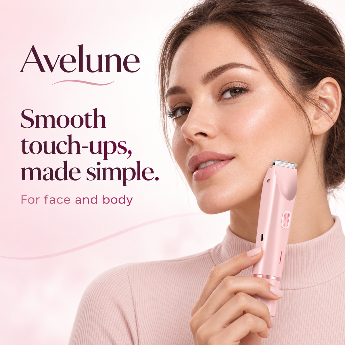A woman holding the Avelune dual-head body shaver beside her face